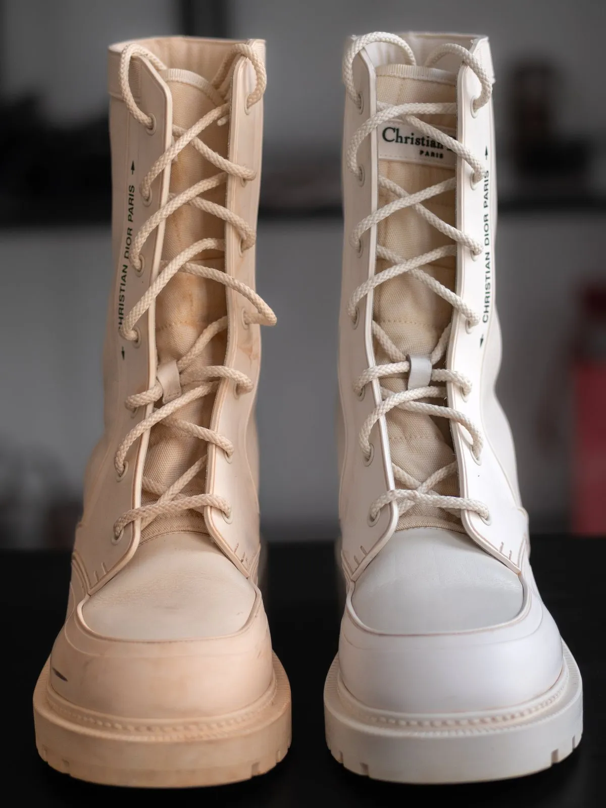 Before and after cleaning of a pair of high white boots